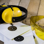Shooting,,Pneumatic,And,Firearms,On,A,Wooden,Table.,Table,On